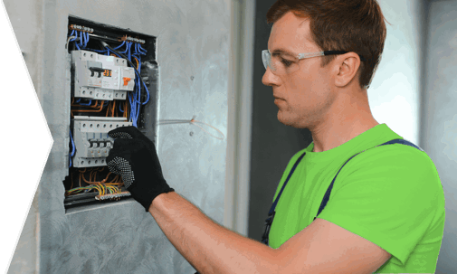 man fixing an electrical panel