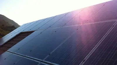 Solar Panels with Sun Rays Photo